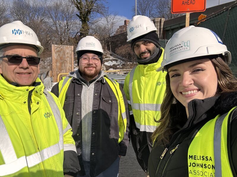 MJA team members Kaitlin and Francisco on site in hard hats